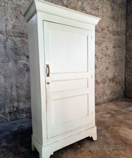 Antique painted pine cabinet with visible wear and patina