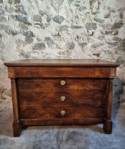 Antique French walnut commode front view four drawers